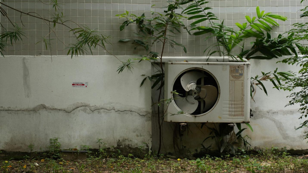 outdoor air conditioning unit mounted on wall